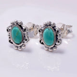 S686 - 925 silver and recon turq stud earrings