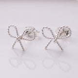 S936 - 925 silver bow stud earrings