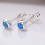 S694 - Round blue opal stud earrings