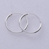 E079 1.2 x 14mm Silver Hoop Earring